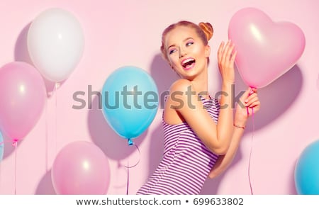 Foto d'archivio: Portrait Of A Joyful Young Girl In Dress