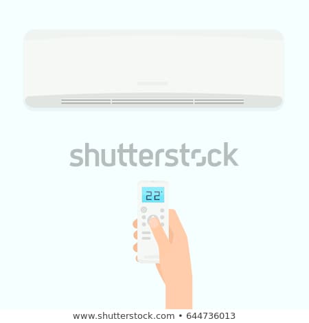 [[stock_photo]]: Man Operating Air Conditioner With Remote Control