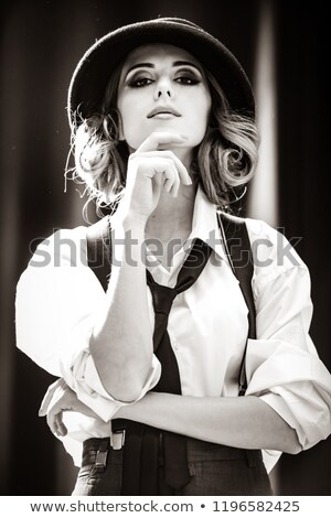 Stock fotó: Fashion Redhead Girl With Tie In Studio