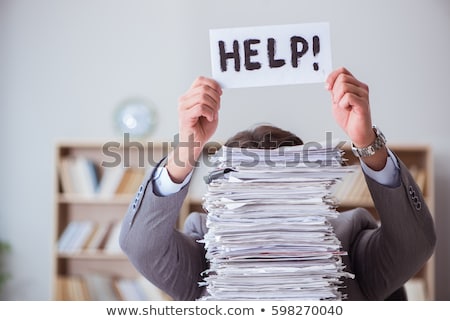 Man With Pile Of Paperwork Imagine de stoc © Elnur