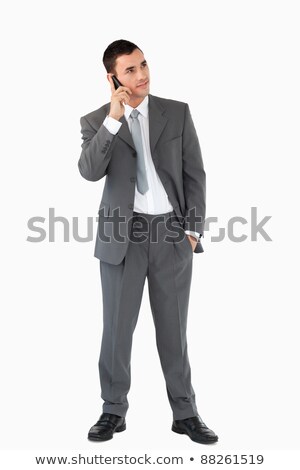 Foto stock: Businessman Listening To Caller Against A White Background