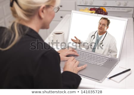 [[stock_photo]]: Female Medical Doctor Surfing On Web With Modern Laptop