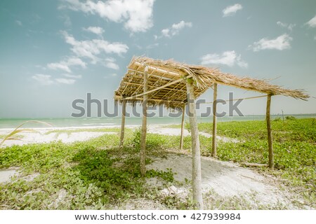 Stock fotó: Sunny Day At Tropical Beach With Fisherman Hut Myanmar Burma