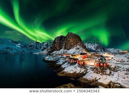 Stok fotoğraf: Northern Lights Over Lake In Finland