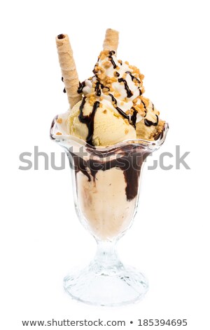 ストックフォト: Vanilla Ice Cream In A Cone With Chocolate Sauce And Brittle