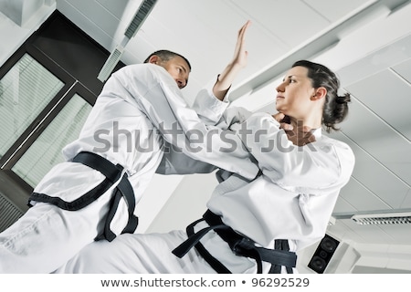 Stockfoto: Man Is Jumping Sport Karate Martial Arts Fight Kick