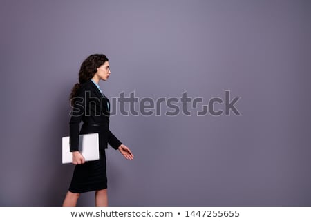 Foto d'archivio: Seriously Businesswoman Holding Jacket