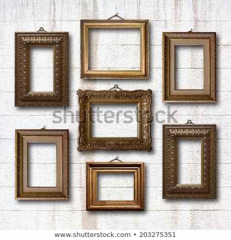 ストックフォト: Gilded Wooden Frames For Pictures On Old Stone Wall