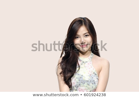 Stock photo: Shy Asian Girl Smiling