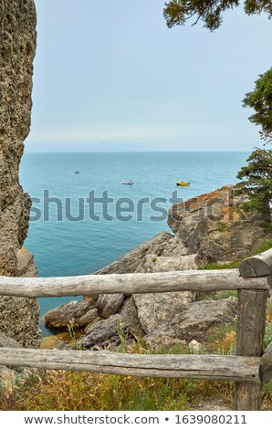 Stockfoto: Rocks And Boats At Crimea Rugged Sea Coast