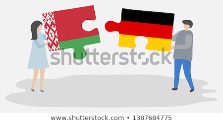 Foto stock: Germany And Belarus Flags In Puzzle