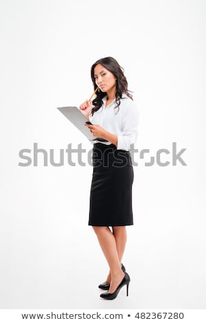 Stock fotó: Beautiful Pensive Asian Businesswoman Holding Clipboard And Thinking About Something