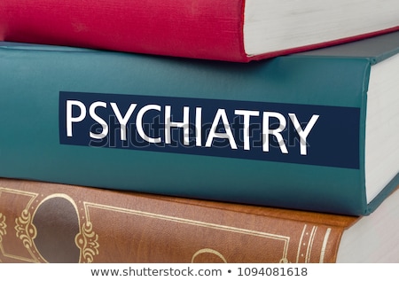 Stockfoto: A Book With The Title Health And Medicine Written On The Spine