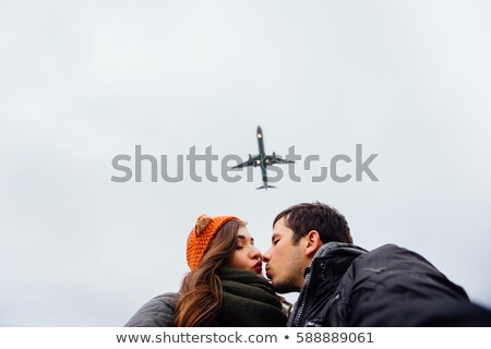 Сток-фото: Young Couples Silhouette And A Storm Landscape