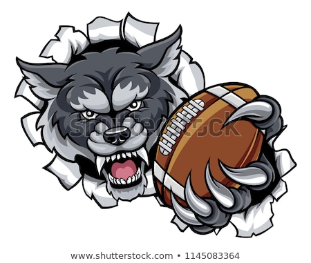 ストックフォト: Wolf American Football Mascot Breaking Background