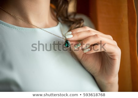 ストックフォト: Hand Holding Stylish Necklace