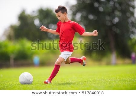 Zdjęcia stock: Little Boy Playing Football