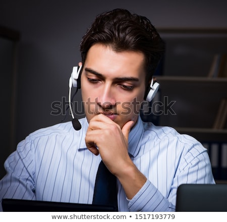 [[stock_photo]]: The Call Center Operator Talking To Customer During Night Shift
