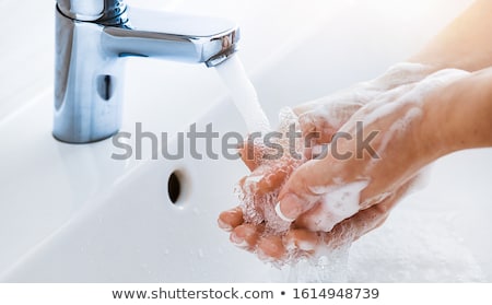 Foto stock: Washing Hands With Soap