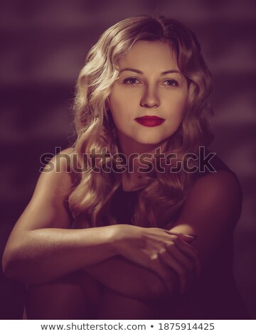 Stock photo: Retro Styled Young Blond In Colorful Makeup