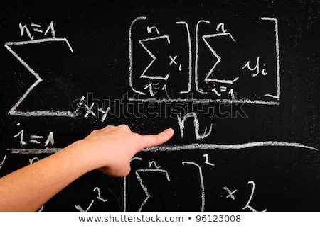Foto stock: Student Hand Pointing On Phisics Formula