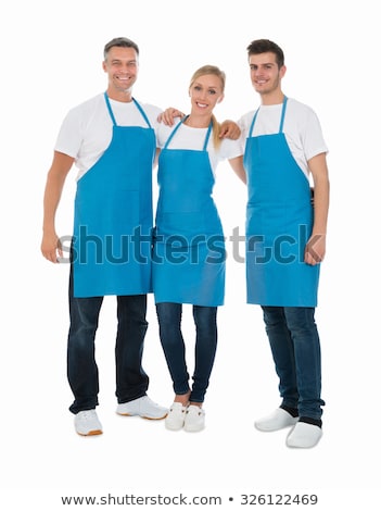 Stockfoto: Man Standing In Blue Apron