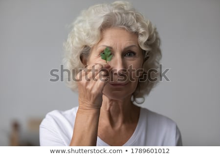 Сток-фото: Woman Holding Fresh Parsley Leaves