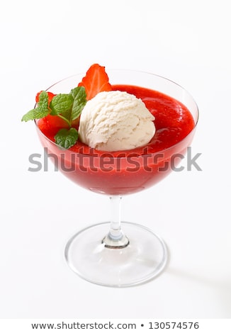 Foto stock: Ice Cream With Strawberry Puree In Coupe