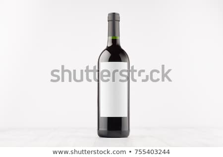 ストックフォト: Green Wine Bottle With Blank White Label On White Wooden Board Mock Up Copy Space