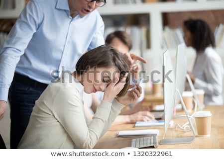 Stockfoto: The Boss Yells At A Subordinate Work And Business