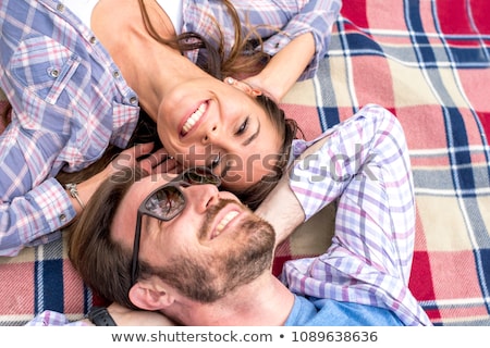 Zdjęcia stock: Couple Laying Out Picnic Blanket
