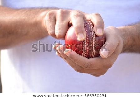 Stockfoto: Cricket Bowler With Ball In Hand
