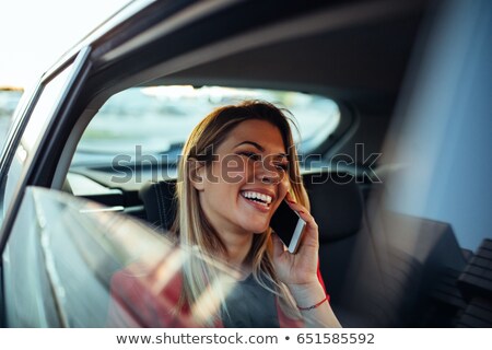 Stock photo: Executive Businesswoman Sit Car Backseat Calling