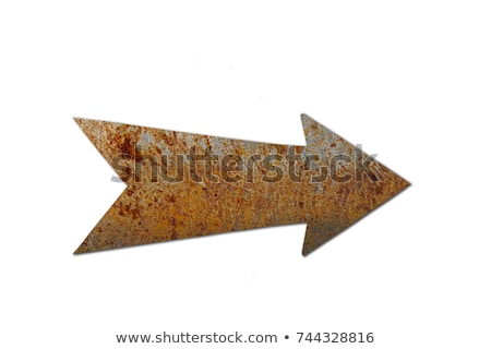 Foto stock: Yellow Arrow On Rusty Metal Surface