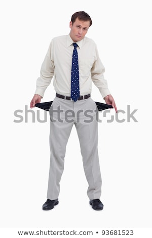 Stok fotoğraf: Sad Tradesman Showing His Empty Pockets Against A White Background