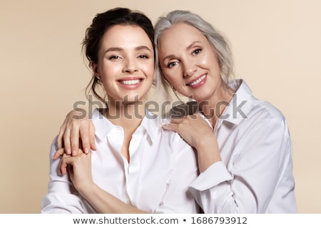 Stock fotó: Family Portrait Of A Young Charming Mother And Two Daughters