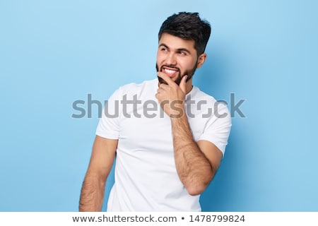 Zdjęcia stock: Smiling Young Business Man Holding His Hand To The Chin