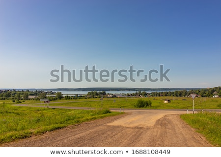 [[stock_photo]]: Settlement Near The Edge Of The Field