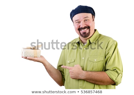 [[stock_photo]]: Smiling Man In Beret Holding Wrapped Gift On White