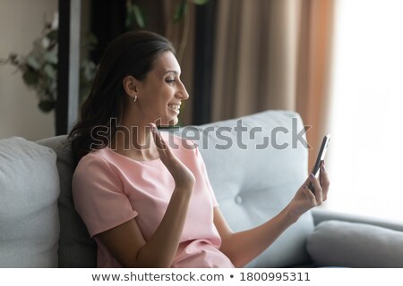 Foto d'archivio: Arabian Business Woman Smiling Happy To Use Cell Phone And Moder