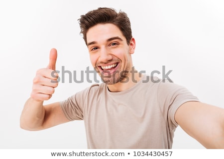 Foto d'archivio: Happy Friends Taking Selfie Over White Background