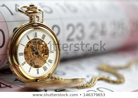 Сток-фото: Gold Pocket Watch And Calendar