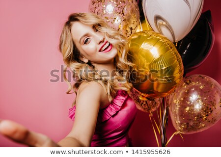 Foto stock: Young Playful Blond Lady