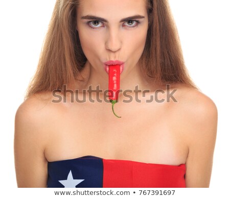 Stockfoto: Close Up Of A Smiling Blonde Woman Holding A Chili