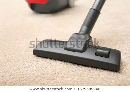 Сток-фото: Vacuum Cleaning The New Carpet
