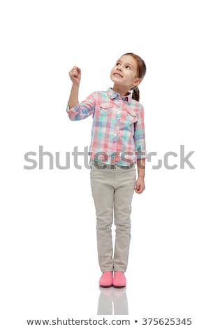 Foto stock: Girl Looking Up And Holding Something Invisible