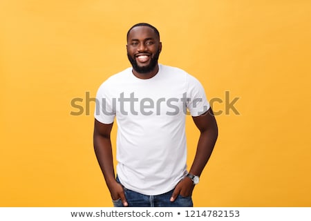 Foto d'archivio: Portrait Of A Joyful Smiling Man In White T Shirt