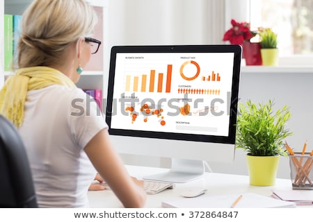 ストックフォト: Woman Working On Statistics Screen With Info