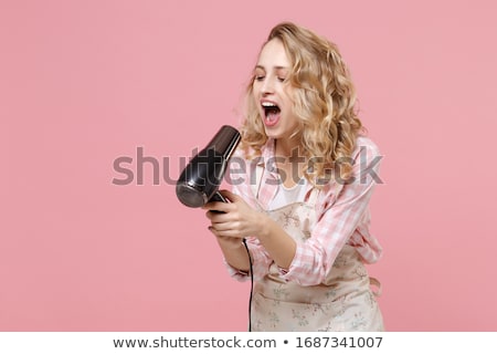 Stock fotó: Housewife Singing With Hair Dryer