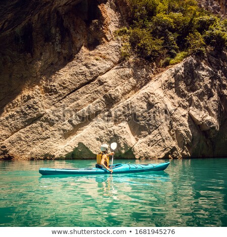 Stock fotó: Woman On A Kayak In The Pyrenees Mountains In Catalonia